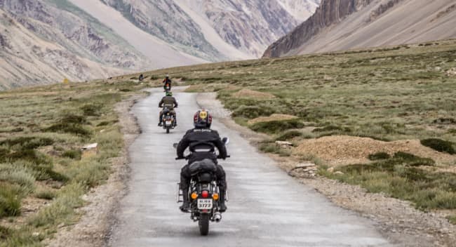 a man riding a motorcycle