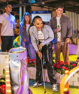 A group play mini-golf