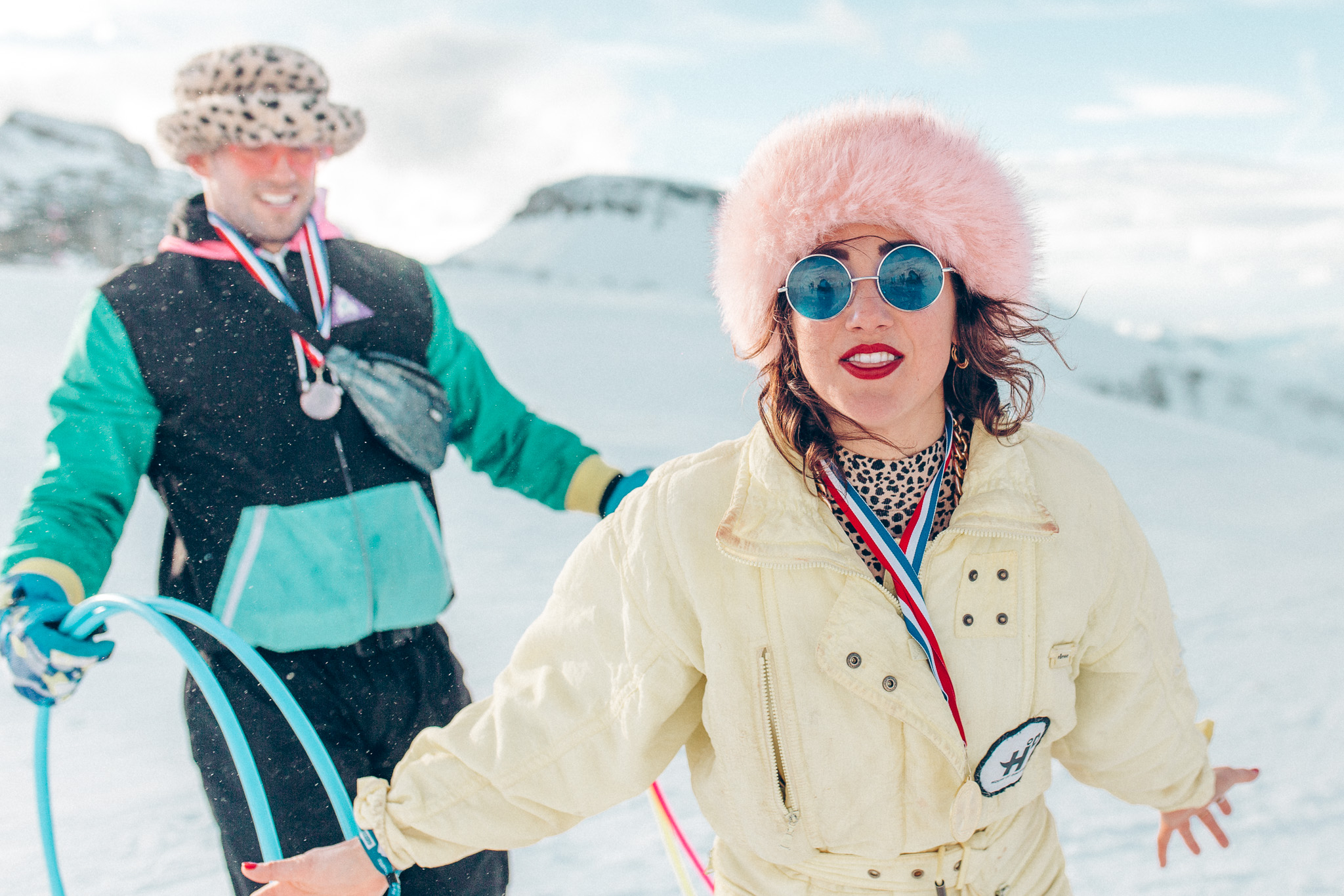 Two people at a snow festival