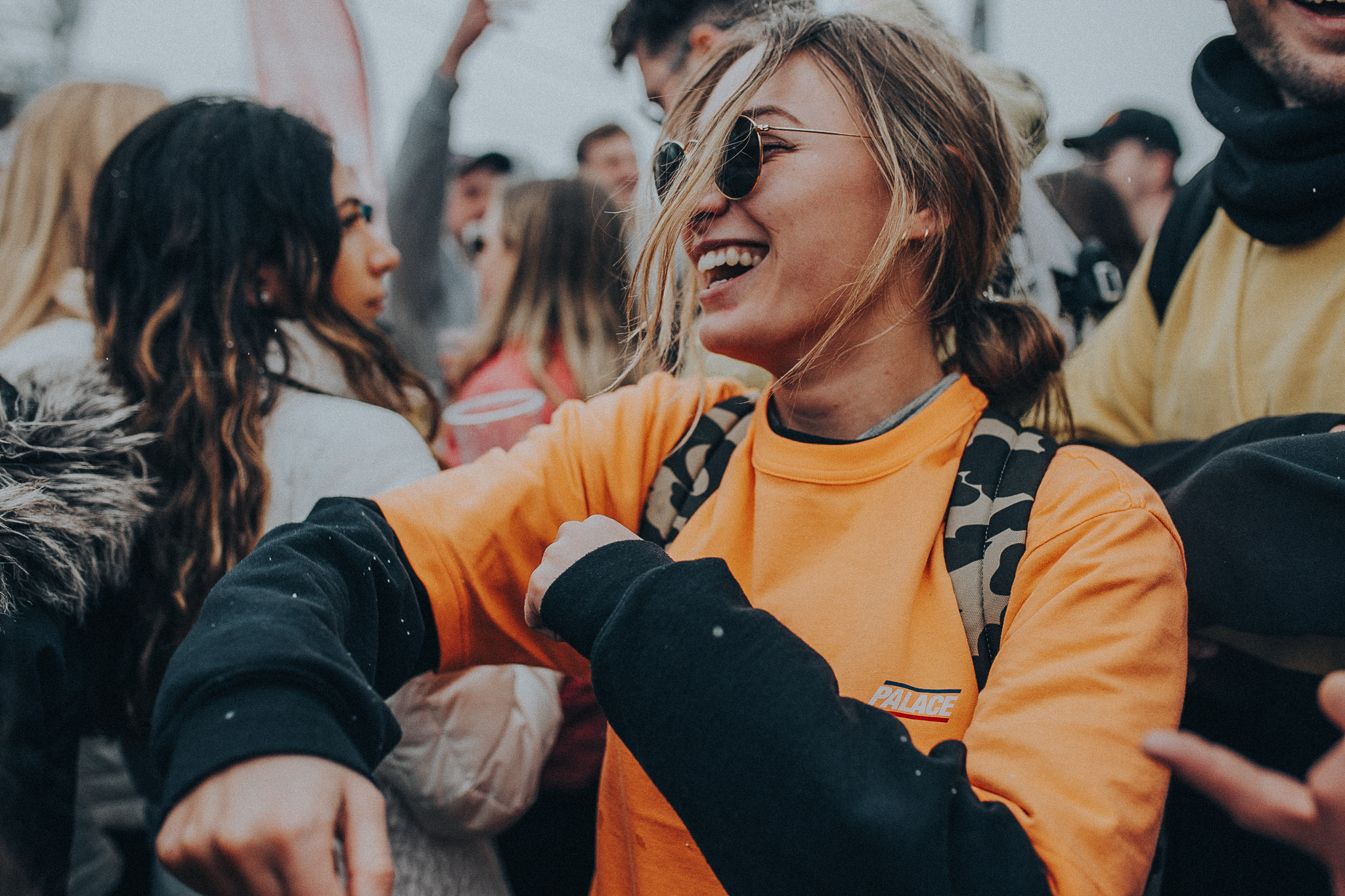 A girl smiling at a festival