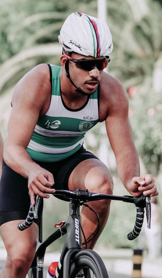 A male cyclist racing